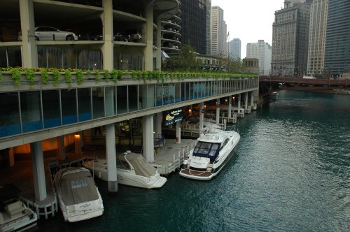 People who live in Chicago have boats as well as cars. Chicago (2007)
