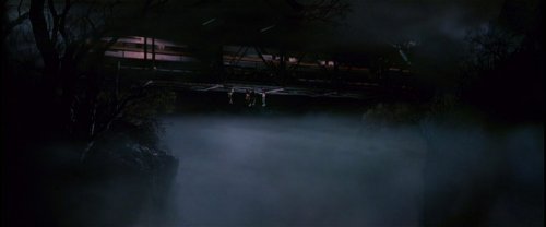 The Lost Boys hang from the bridge as a train passes over… see the similarity? The Lost Boys (1987)