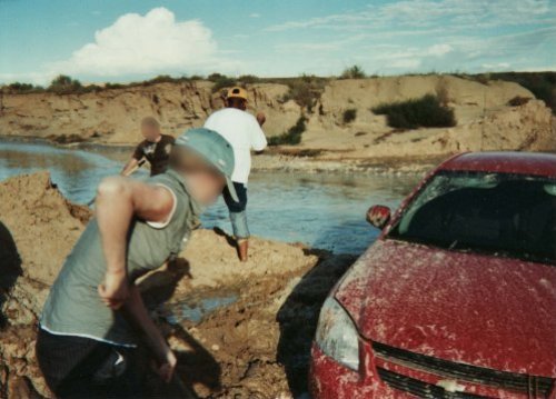 With a little help from a Native American woman we found from the 'Hopi' tribe and her son (aged about 15) we managed to dig the car out in about 4 hours. We then used her big truck to pull the car out and we were back on our way... Arizona (2007)