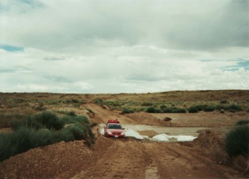 The rain caused the sand road to turn to mud and our car go seriously stuck in the middle of nowhere So we decided to leave all our belongings and went walking to find help before it got dark...Arizona (2007)