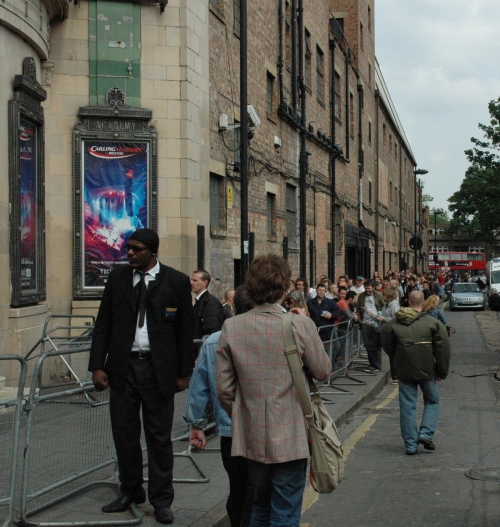 The queue to get into the venu stretches right around the block! Good job there is security there to keep all the cattle in order. London, 2008