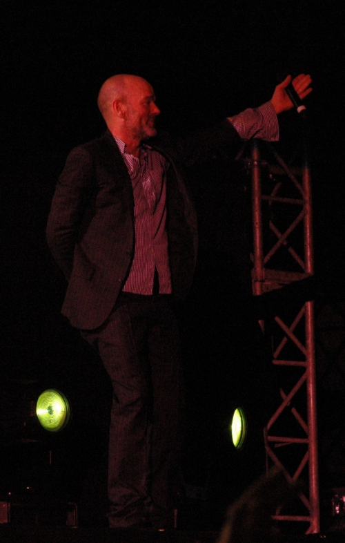 After the show, Michael Stipe directs traffic out of the car park. What a nice, helpful man he is. Manchester (2008)