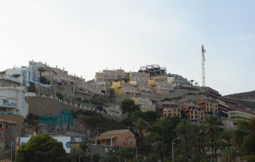 There are lots of cranes in Spain building houses for the British to buy for a fraction of the price of a house in Britain, Spain (2006)