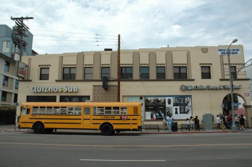 A yellow school bus driving through the Venice area. Los Angeles (2007)