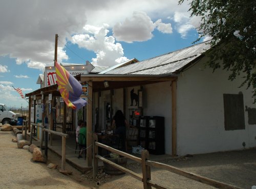A nice little store we stopped off at in the desert, they sold everything you could need. Some people sat outside eating a nice meal. Arizona (2007)