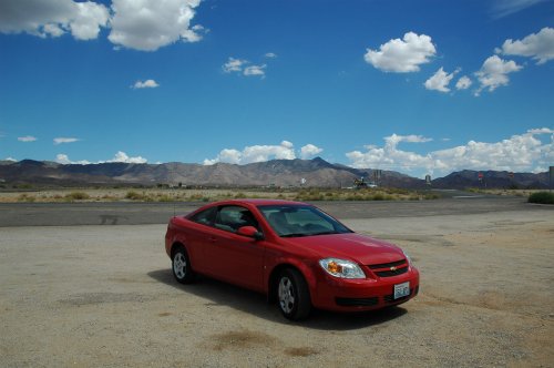 Our car parked up in the middle of the desert. We stopped to pick up some drinks at a store we drank a lot on this road trip. Arizona (2007)