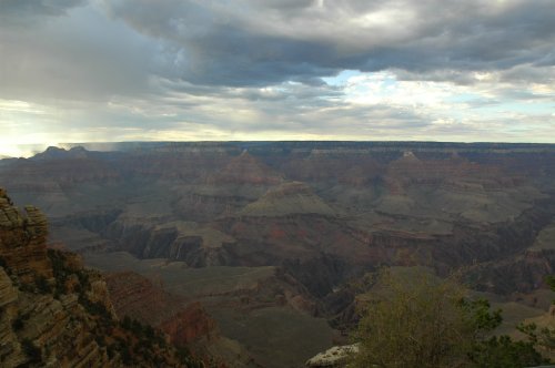 Some people brought small gas cookers and we're cooking and eating their food while watching the sun go down on the Grand Canyon. Lots of nice light beams and cloud patterns make the Grand Canyon look amazing. Arizona (2007)