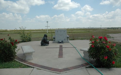 Lots of Crosses and Statues of people praying. Texas (2007)